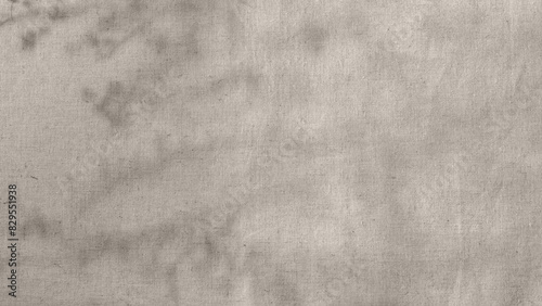 Obraz na plátně Abstract floral sunlight shadows on neutral light taupe beige linen cloth backgr