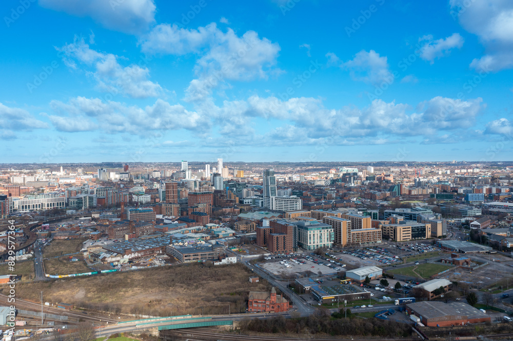 Fototapeta premium Aerial photo of the British town of Leeds in West Yorkshire UK, showing the Leeds City Centre taken with with a drone on a bright sunny day in the town of Holbeck near to the centre.