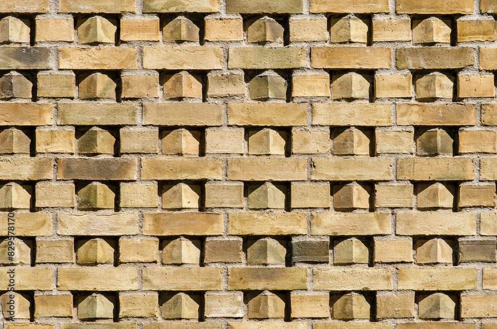 Sunlight and shadow add an extra layer of interest to a decorative brick facade in Leiden, The Netherlands Sunlight and shadow add an extra layer of interest to a decorative brick facade in Leiden, The Netherlands