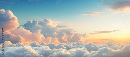 Cumulus clouds resembling soft white cotton balls float in the blue sky like a painting Their beauty shines during sunset showcasing a variety of sizes and shapes against a colorful backdrop with copy