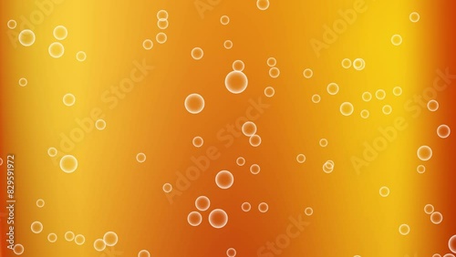 Close up background of pouring beer with bubbles and foam in glass