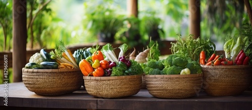 Fresh organic vegetables in baskets made of handmade bamboo. Copy space image. Place for adding text and design photo