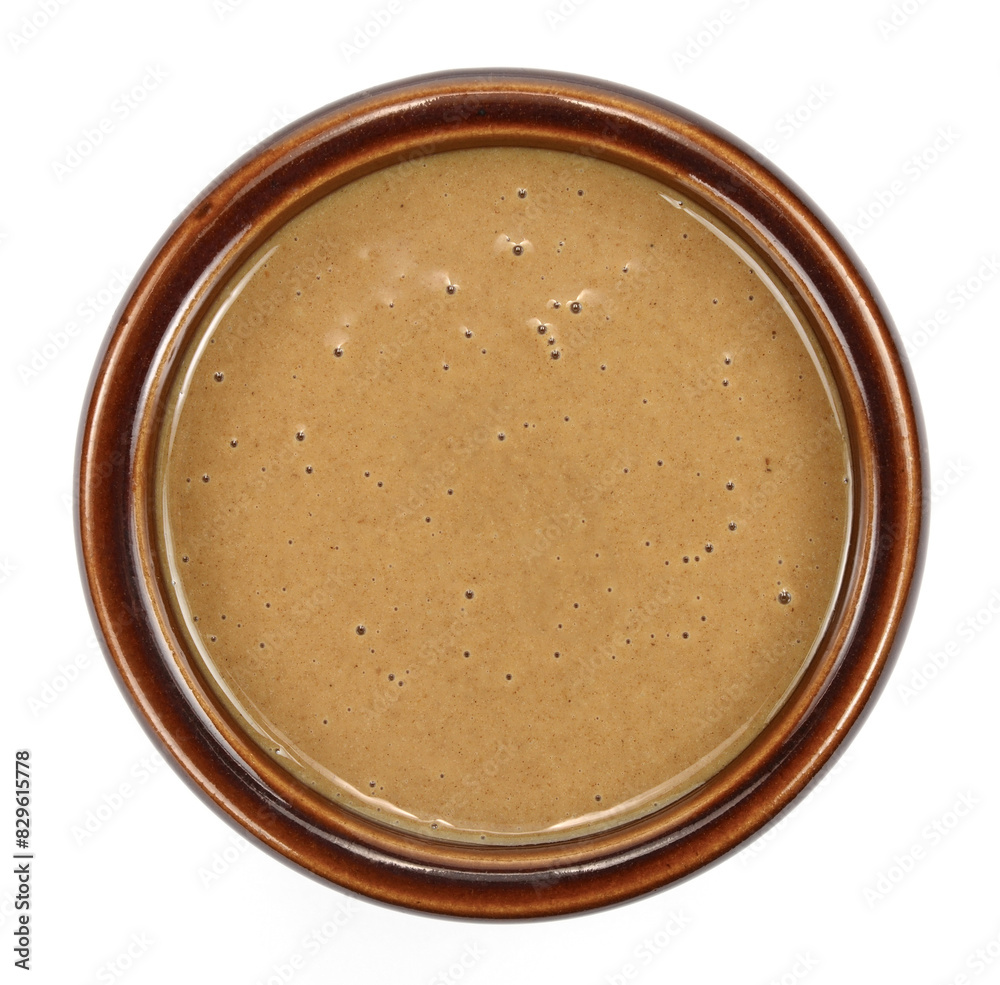 Sesame sauce. Tahini isolated on white background Sesame sauce. Tahini isolated on white background