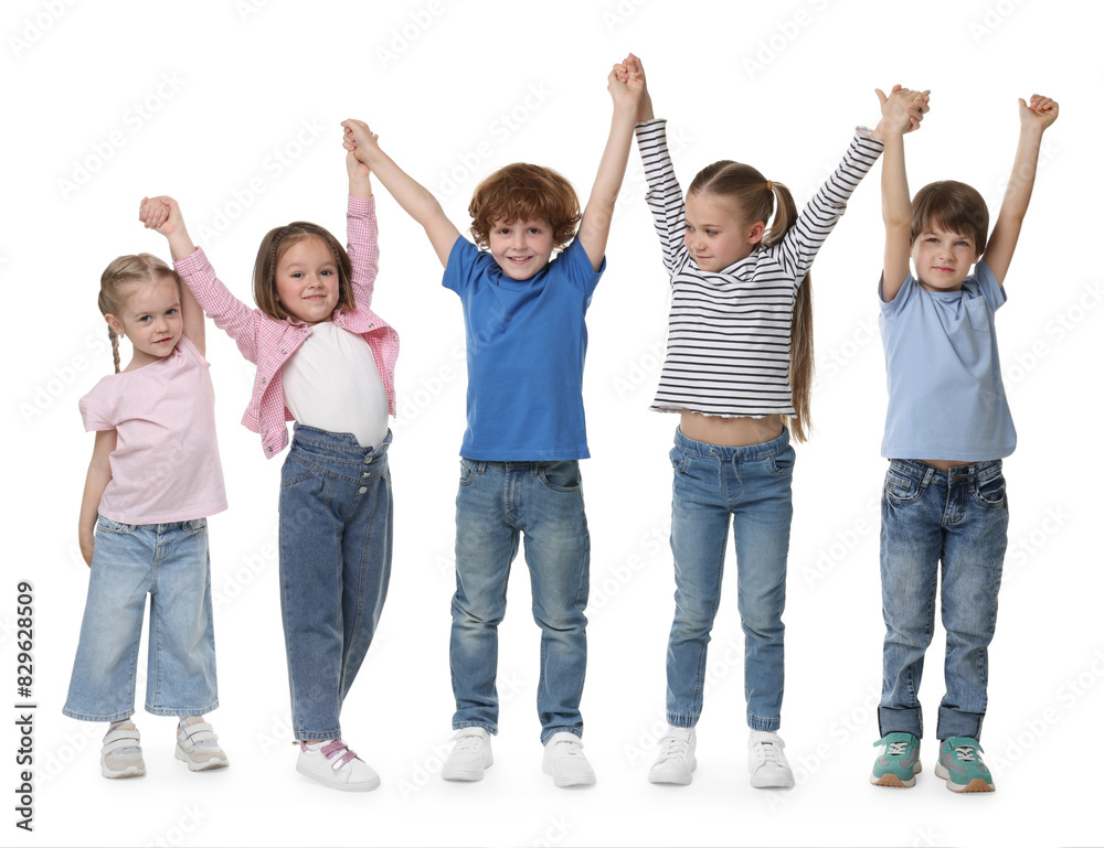 Group of cute children holding hands on white background Group of cute children holding hands on white background