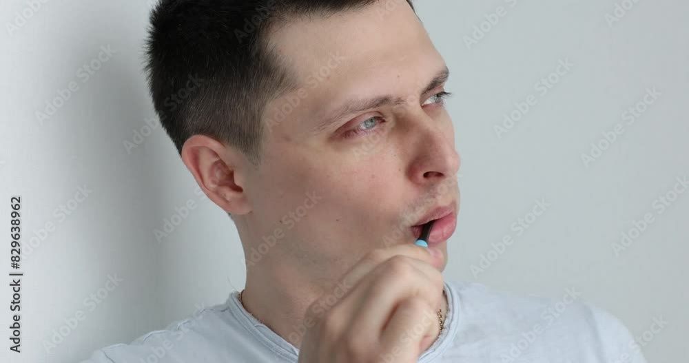 happy man brushing teeth with toothbrush, hygienic routine happy man brushing teeth with toothbrush, hygienic routine
