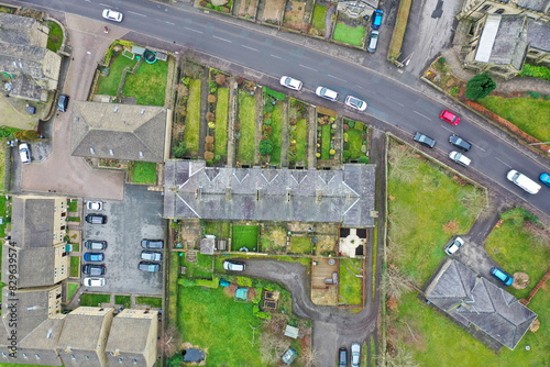 Straight down aerial drone photo of the village of Lightcliffe in Halifax in West Yorkshire in the UK, showing a row of historic victorian residential houses on a cold day in the winter time