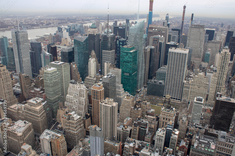 Aerial view of Manhattan in New York City showing the classic high rise buildings and city scape in the USA