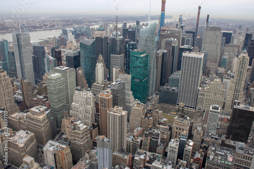 Obraz na płótnie Aerial view of Manhattan in New York City showing the classic high rise buildings and city scape in the USA w salonie