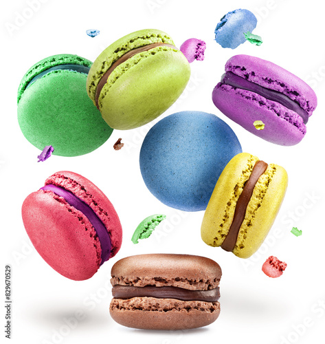 Colorful french macaroon cookies levitating in air on white background. File contains clipping paths.