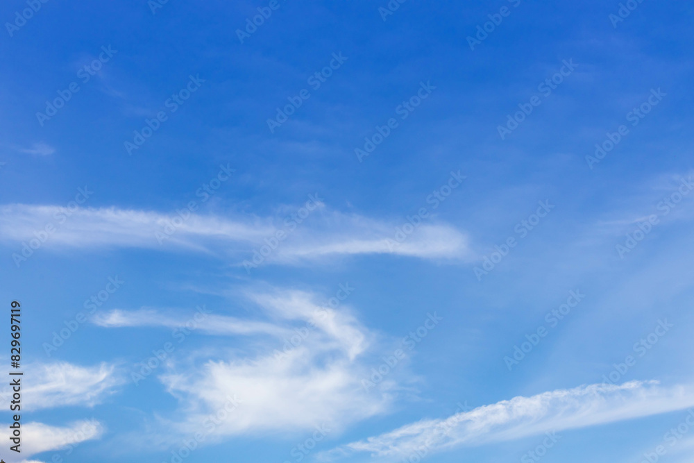 Blue sky background with tiny clouds. Cloudscape - Blue sky and white clouds. Clouds with blue sky Blue sky background with tiny clouds. Cloudscape - Blue sky and white clouds. Clouds with blue sky