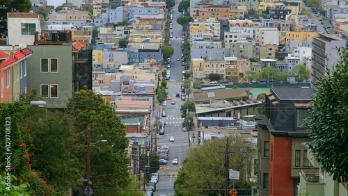 Lombard Street Views with Traffic Between Buildings in San Francisco, USA.