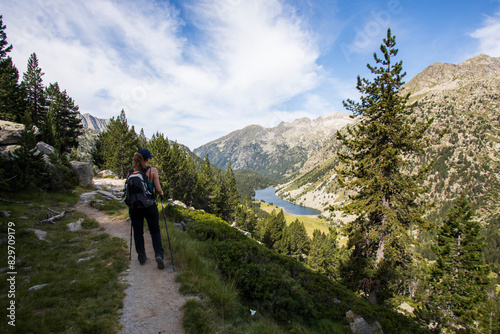 Young hiker woman in Vall de Boi, Aiguestortes and Sant Maurici National Park, Spain © Alberto Gonzalez 