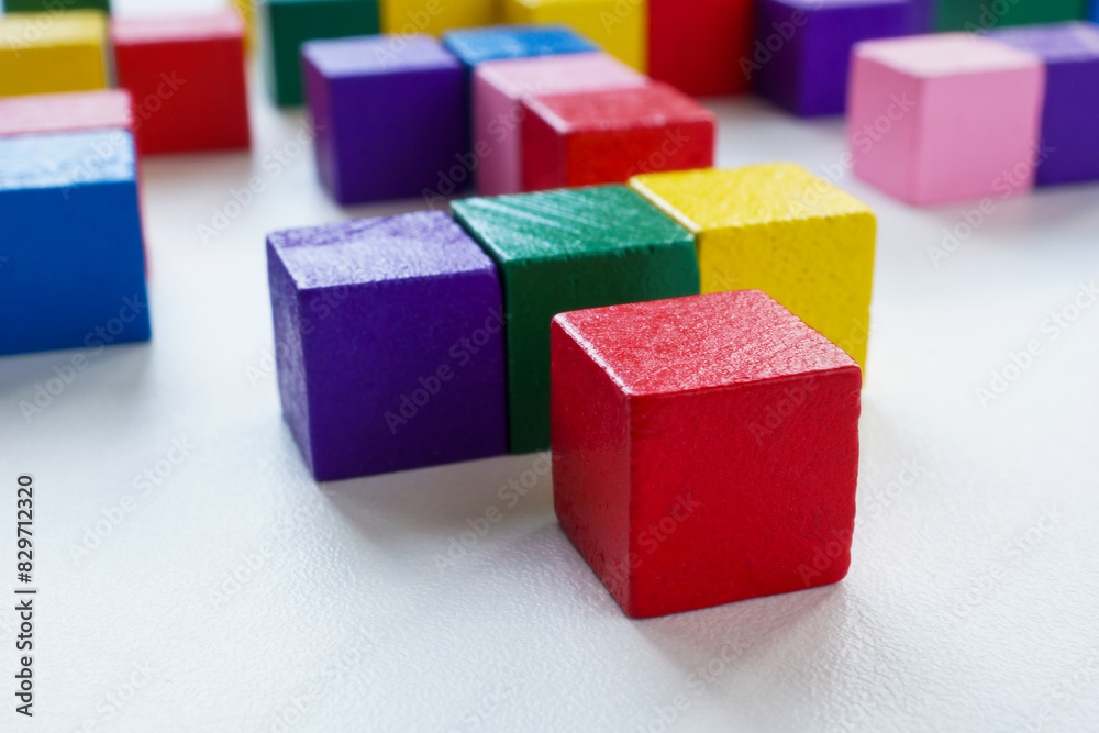 The structure of an abstract labyrinth from colored cubes. Difficult interaction in the company. The structure of an abstract labyrinth from colored cubes. Difficult interaction in the company.