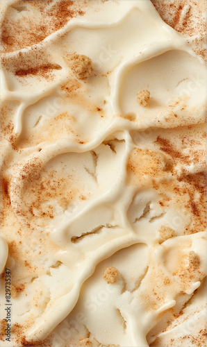 churro ice cream surface close-up shot, a closeup of the churro ice cream texture, highlighting its creamy base with cinnamon and sugar swirls and chunks of churro