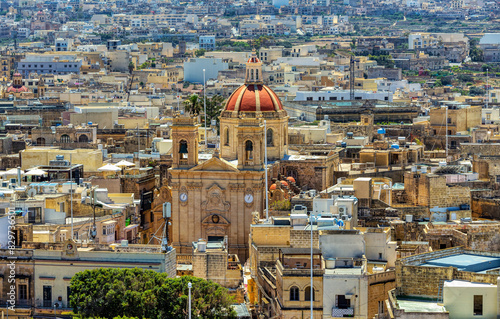 Historic Citadel in Victoria offers a stunning vantage point to view St. George's Basilica amid Gozo's terracotta rooftops. Gozo Malta