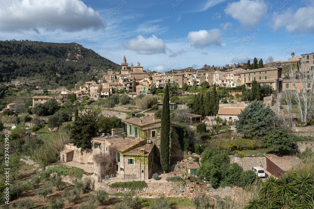Fototapeta premium Scenic Valldemossa Town in Palma de Mallorca under a cloudy blue sky