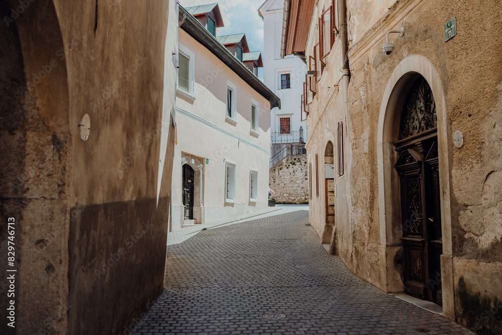 Scenic street in Skofja Loka, Slovenia, with charming architecture Scenic street in Skofja Loka, Slovenia, with charming architecture
