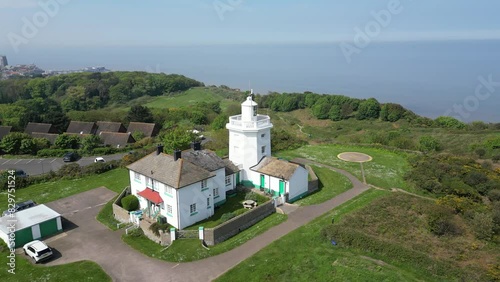 Drone shot of the lighthouse in Cromer with panoramic view of the sourrounding. photo