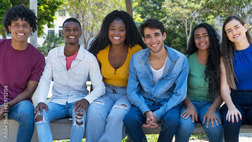 Youth of South America - Laughing latin american and hispanic and african american and caucasian young adults