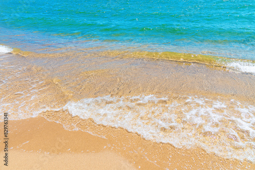 Soft blue ocean wave or clear sea on clean sandy beach summer concept © Ms VectorPlus