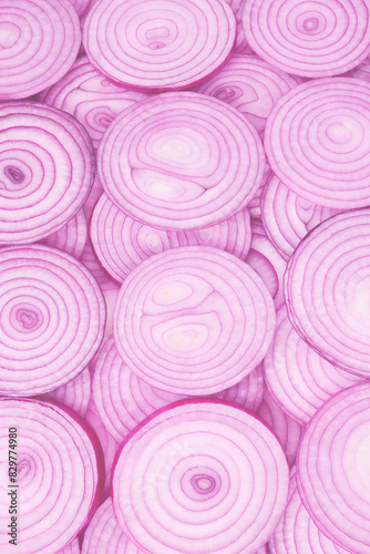 Onion slices as a background. Top view.