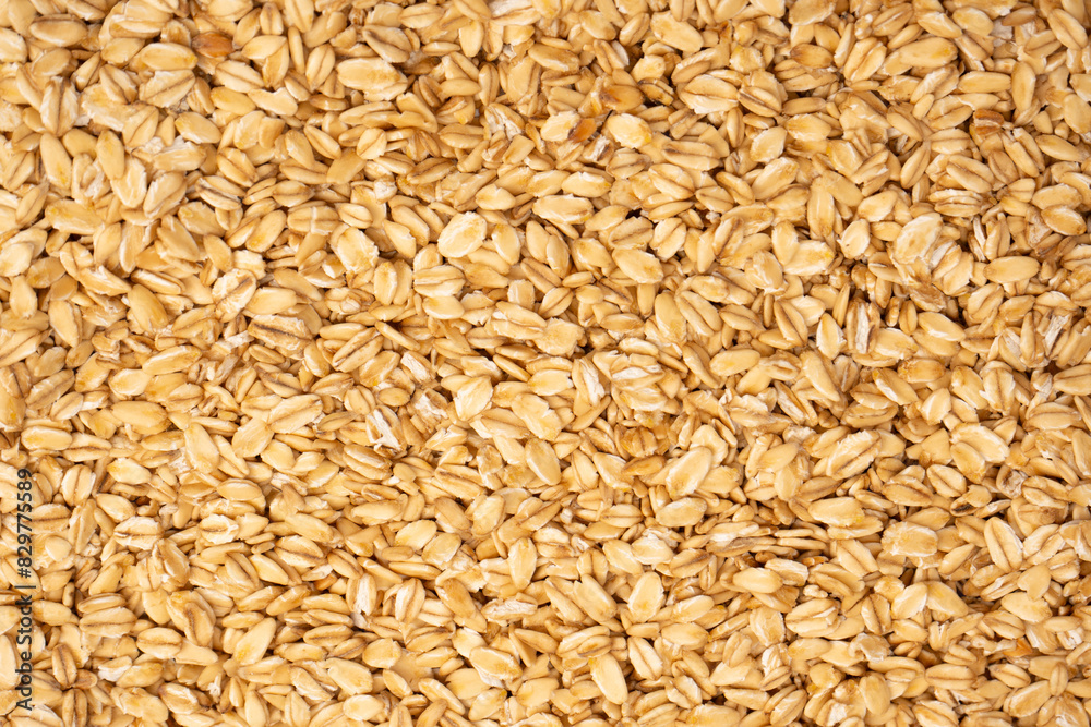 Oat-flakes as a background. Top view. Oat-flakes as a background. Top view.