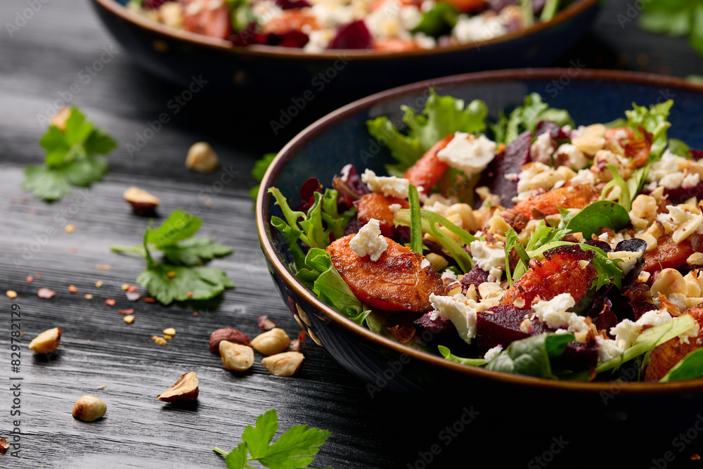 Warm baked carrots and beetroot salad with feta cheese and roasted hazelnuts Warm baked carrots and beetroot salad with feta cheese and roasted hazelnuts