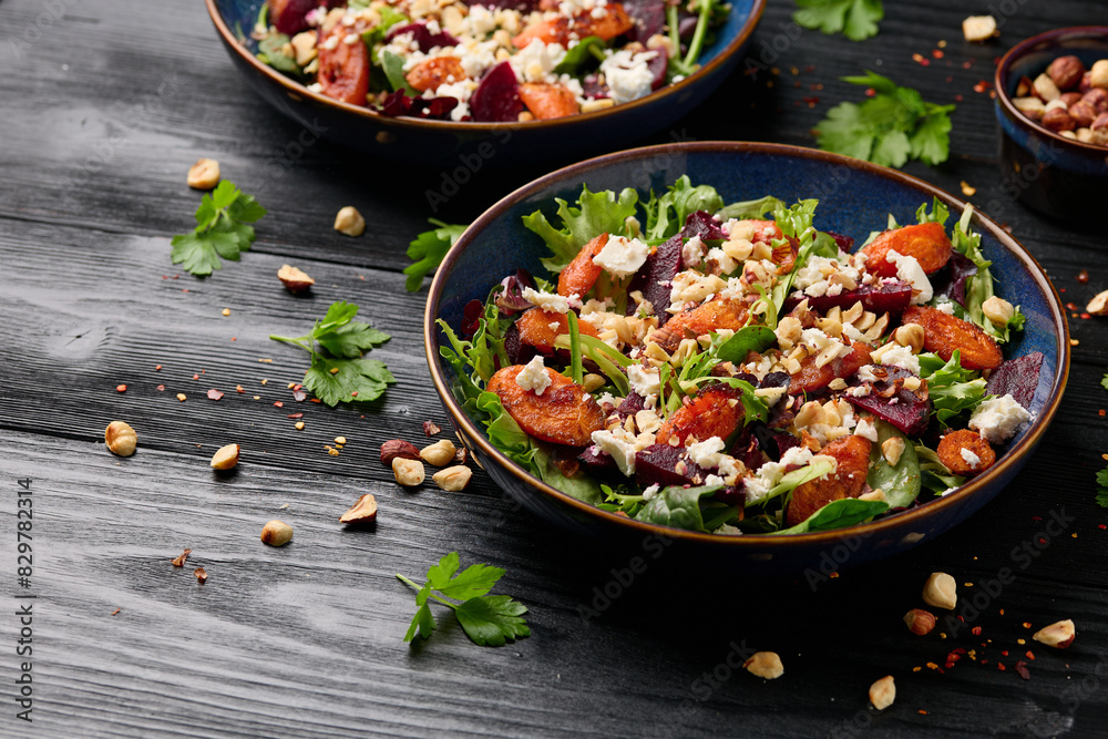 Warm baked carrots and beetroot salad with feta cheese and roasted hazelnuts Warm baked carrots and beetroot salad with feta cheese and roasted hazelnuts