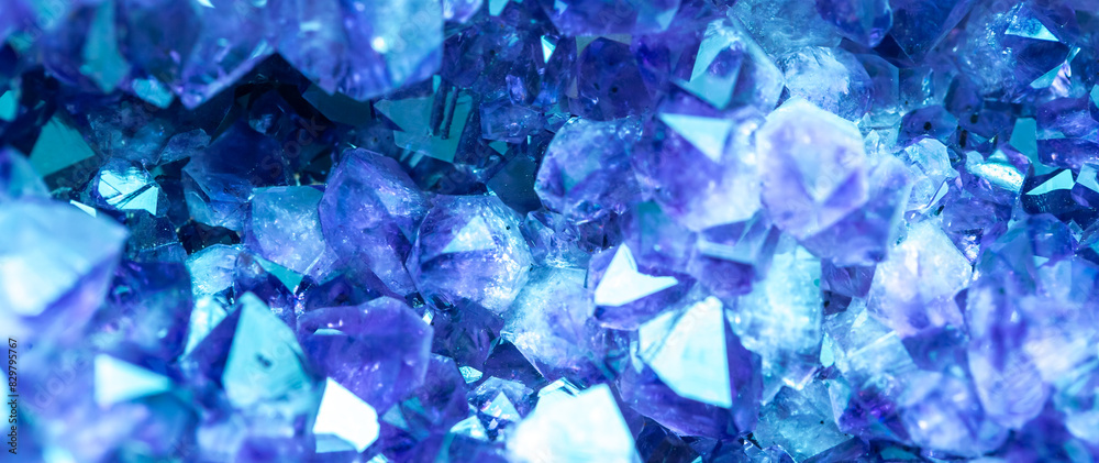 Blue Crystal Mineral Stone. Gems. Mineral crystals in the natural environment. Texture of precious and semiprecious stones. Seamless background with copy space colored shiny surface of precious stones Blue Crystal Mineral Stone. Gems. Mineral crystals in the natural environment. Texture of precious and semiprecious stones. Seamless background with copy space colored shiny surface of precious stones