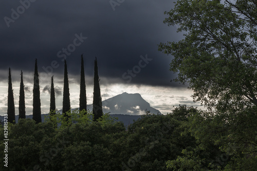 the Sainte Victoire mountain in the light of a cloudy spring morning photo