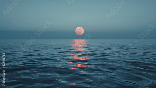 Full Moon Rising Over Calm Ocean with Pink Clouds and Serene Sky