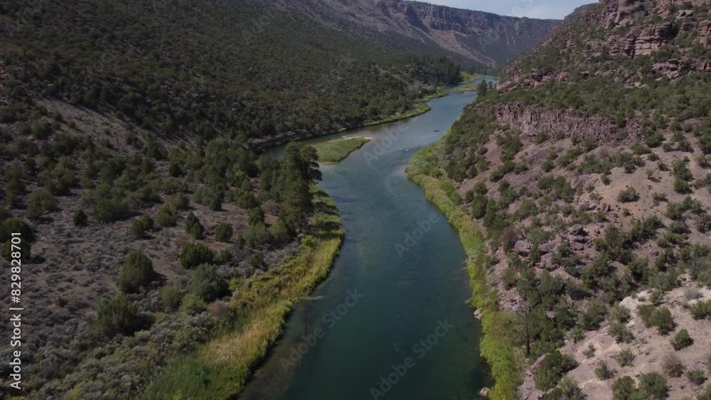Forward moving and rotating aerial view of Green River in Utah with fishing boat Forward moving and rotating aerial view of Green River in Utah with fishing boat