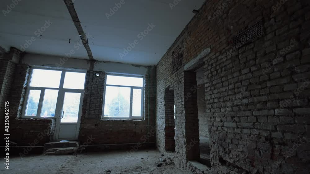 Brick walls with doorways in them. Construction or reconstruction of a big building. Brick walls with doorways in them. Construction or reconstruction of a big building.