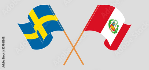 Crossed and waving flags of Sweden and Peru
