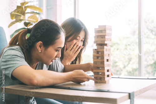 Southeast asian playing  board game wooden block tower at home