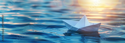 Paper boat sailing on blue boundless water. Small white origami boat In big ocean with blue sky and sunshine. Leadership concept with paper ship. Business for innovative solution. Opportunity, vision.