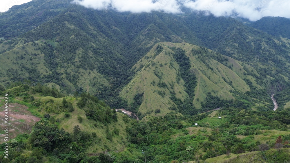 Aerial view panorama of the village with a mountain background Aerial view panorama of the village with a mountain background