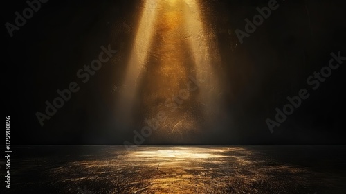dramatic black and gold spotlight effect with grainy texture and color gradient abstract glowing background illustration photo