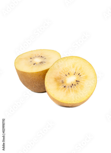 Two juicy halves of gold kiwi fruit isolated on white background