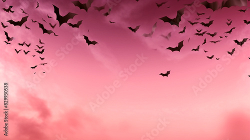 bats on pink halloween background