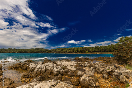 Landscape of the Croatian coast around Rovinj, rocky beaches, azure Adriatic Sea