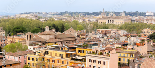 Rome, Italy - April 09, 2024: View of the roof sin Rome with tourists crowding its surroundings in Rome, Italy photo