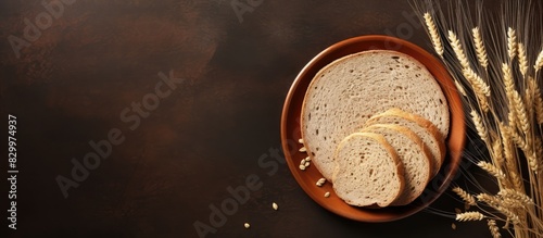 A plate displays multigrain bread slices embodying freshness and a breakfast concept The image provides copy space to highlight the bread made with finger millet and whole wheat flour photo