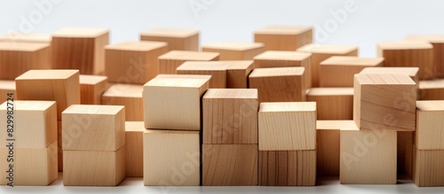 Isolated on a white background a close up image of wooden blocks for a game is available with copy space for text or design