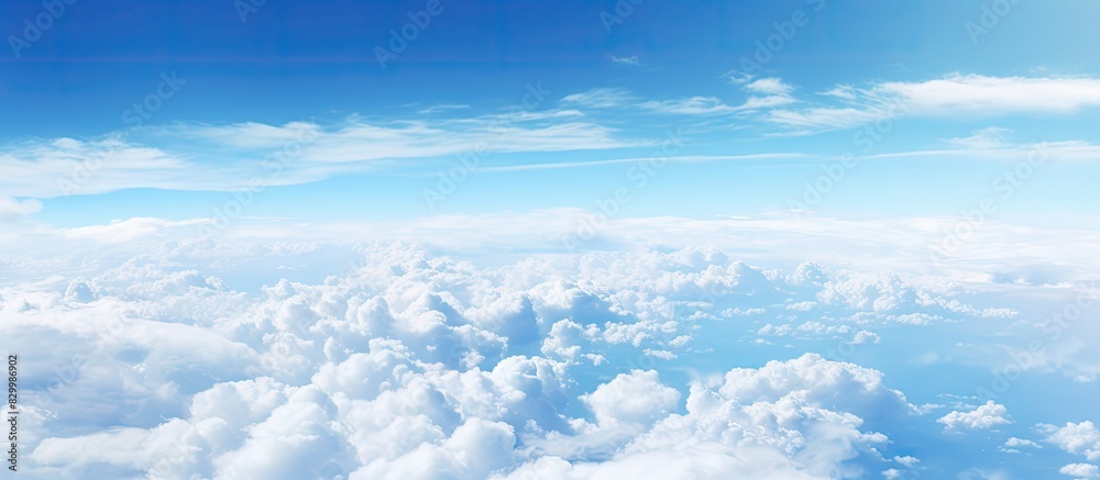 Capture images of the vibrant blue sky from the airplane leaving ample space for creative use or text overlay