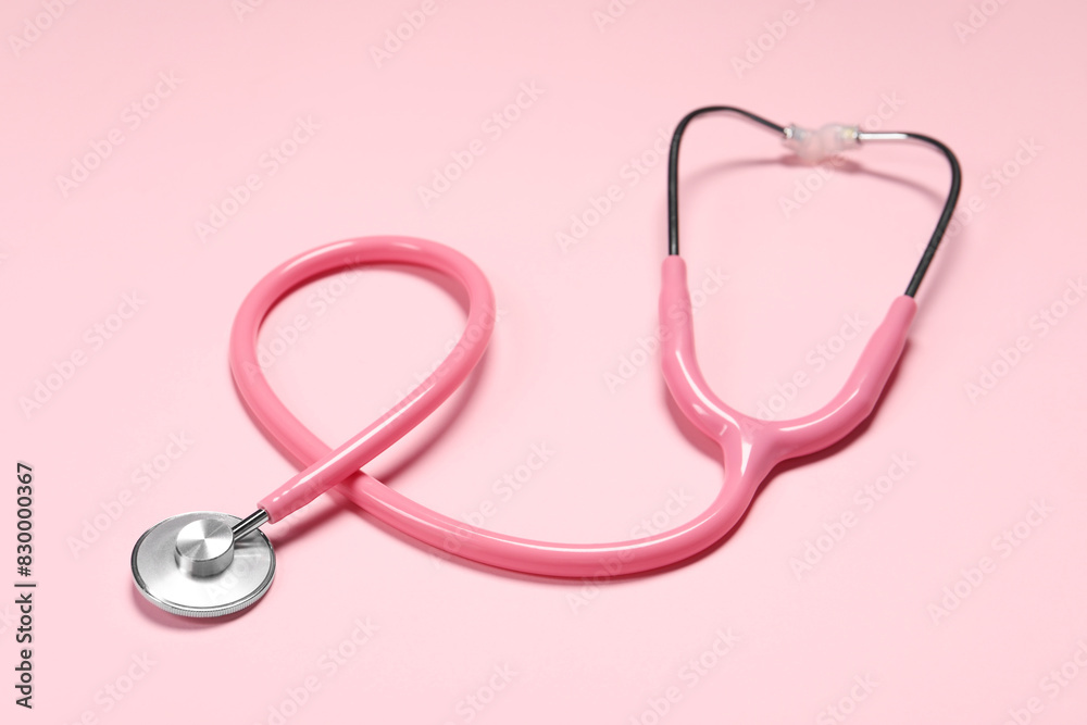 One stethoscope on pink background. Medical tool One stethoscope on pink background. Medical tool