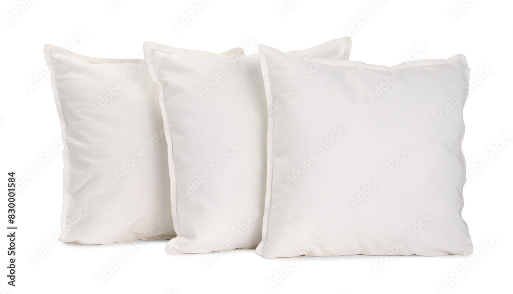 Many new soft pillows isolated on white