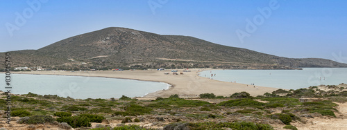 Windsurfers  riding at the Prasonisi kite beach during low tide at Rhodes island,  Greece