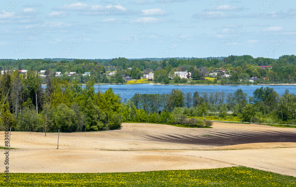 Obraz premium Next to Aulejas lake (Aulejs). Village Auleja --Landscape, Latvia, in the countryside of Latgale.