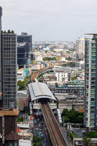 Canvas Print Punnawithi Station, Bangkok, Thailand - August 8, 2023: Infrastructure of BTS Skytrain in Sukhumvit Line with city building around the area